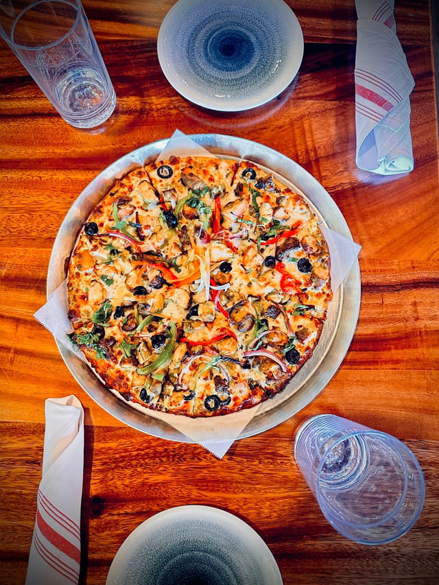 Green Herb Chicken Pizza.